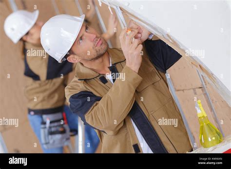 construction worker wearing helmet Stock Photo - Alamy