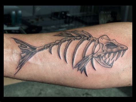 Skeleton Fish Tattoos – Tattoo Ideas Center | Tattoos for guys, Small shark tattoo, Fish bone tattoo