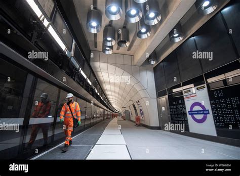 The curved platform of the new Elizabeth Line at Tottenham Court Road ...