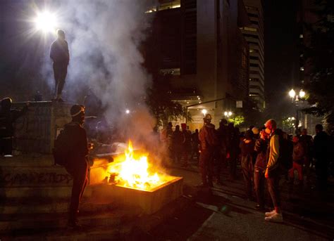 US official visits Portland, calls protesters 'anarchists'