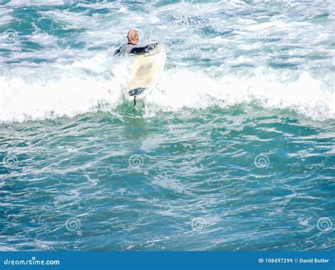 Surfing at Maukatia Maori Bay and Muriwai Beach, , Auckland, New Zealand Editorial Stock Image ...