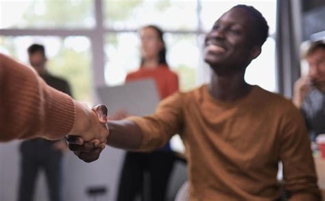 Premium Photo | Business people shaking hands in office