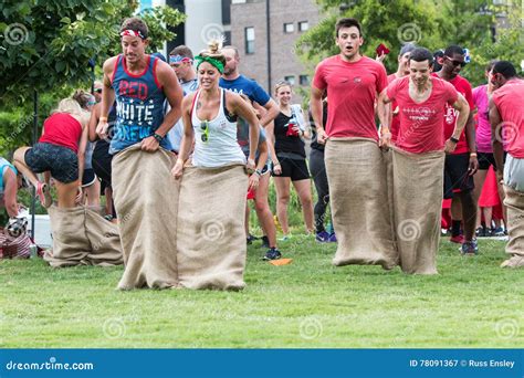 Young Adults Participate in Sack Race at Atlanta Field Day Editorial ...