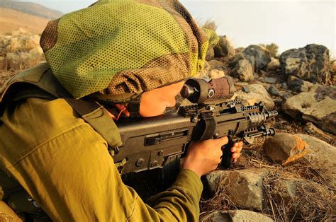 An Israeli soldier with the Granite Battalion, Nahal Brigade, training in the Golan Heights ...