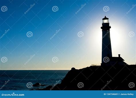 Lighthouse Silhouette at Sunset Stock Image - Image of park, lighthouse: 134734669