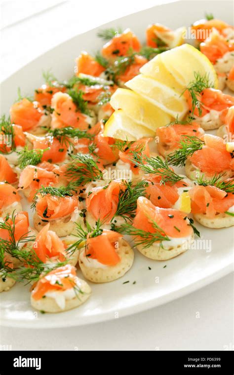 smoked salmon blinis appetizer Stock Photo - Alamy