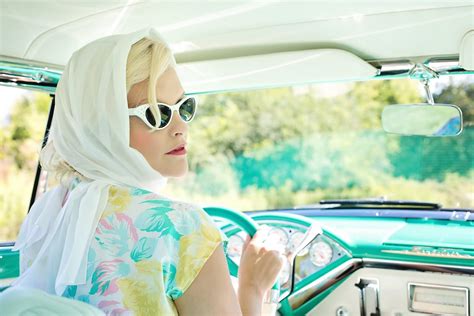Woman Driving Vintage Car on Road during Daytime · Free Stock Photo