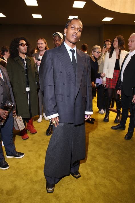 A$AP Rocky Styles Oversized Suit & Cap Toe Boots at Gucci MFW Show – Footwear News