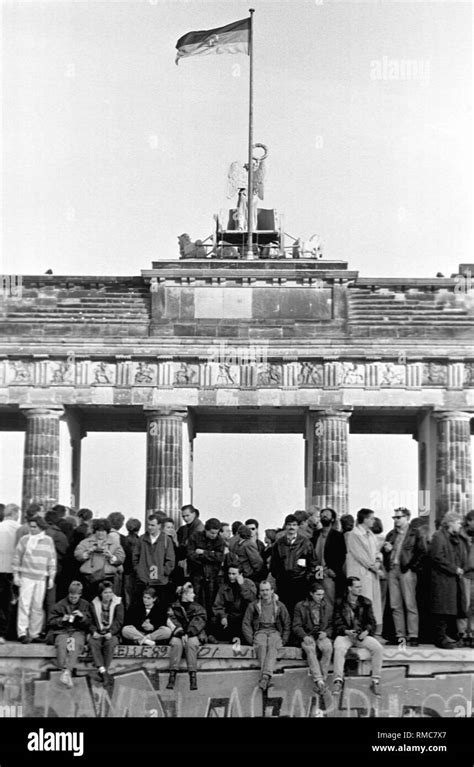 Berlin, November 10, 1989: Thousands of Berliners are gathering at the Berlin Wall at the ...