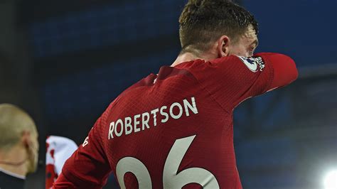 Did linesman elbow Andy Robertson? Liverpool defender involved in h...