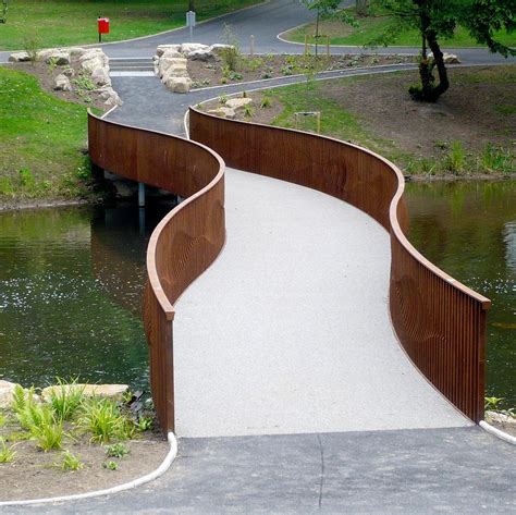 Corten Steel Bridge......Barnes Park | Pedestrian bridge, Modern landscaping, Landscape stairs