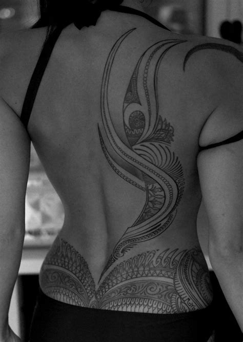 Intricate Polynesian Ribcage Tattoo Design