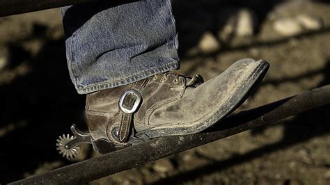 Cowboy Boots and Spurs Photograph by James Sage - Pixels