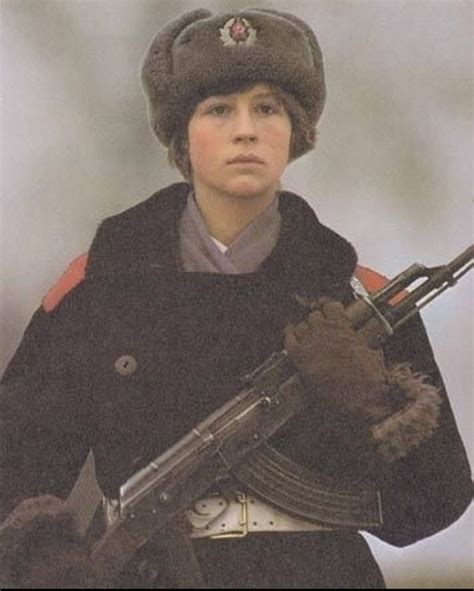 Female Soviet guard Is photographed while guarding a WWII monument in the Town of Irkutsk 1980s ...