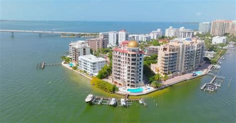 Aerial view of Sarasota skyline over the harbor with Ringling Causeway ...