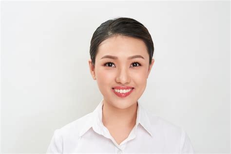 Premium Photo | Passport photo. Portrait of asian smiling woman.