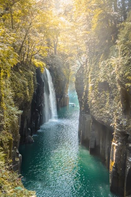 Premium Photo | Waterfall and boat at takachiho gorge in takachiho ...