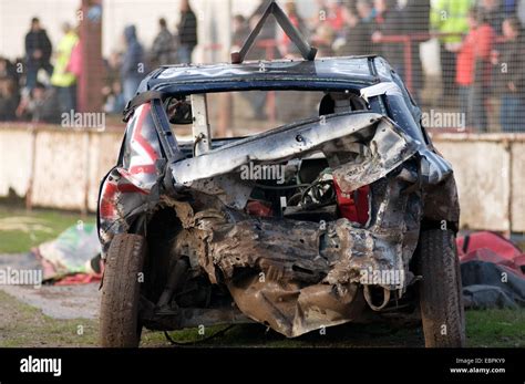 smashed up old junk car cars demolition derbies derby destruction Stock Photo, Royalty Free ...