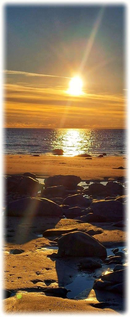 SUN RAYS ON THE BEACH | Stunning colours on Llandanwg beach.… | Flickr