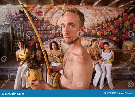 Capoeira Performer Playing Music Stock Image - Image of arts, friend: 35303777