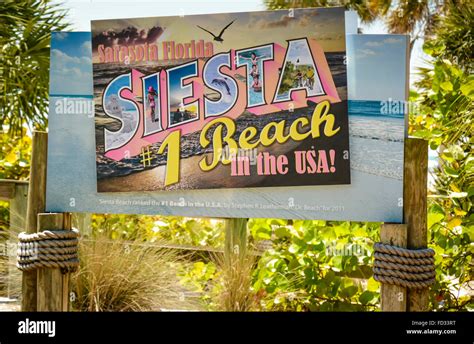 Siesta Key Beach, A colorful old postcard looking sign proclaims the entrance to The #1 Beach in ...