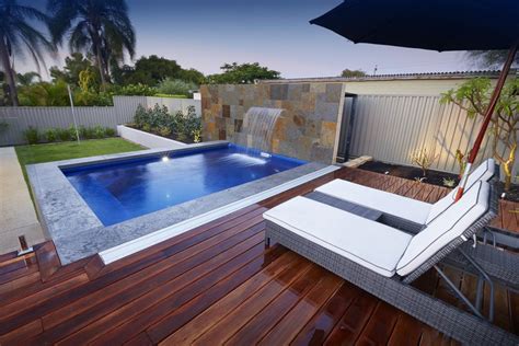 One of our 4.7m Ultimate Plunge Pools with a water feature. Location ...