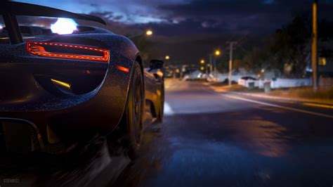 time-lapsed photography of black luxury car on asphalt road during ...