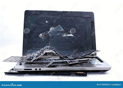 The Laptop is Smashed To Pieces. the Screen is Cracked, the Keyboard is Broken. Electro Waste ...