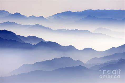 Mountain mist in blue Photograph by King Wu | Fine Art America