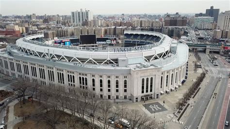 Yankee Stadium drone aerial across front entrance New York City NYC 4K ...