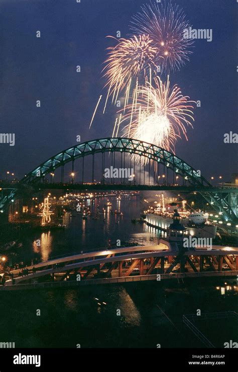 Fireworks on the Tyne Bridge and the Swing Bridge 01 01 2000 Stock ...