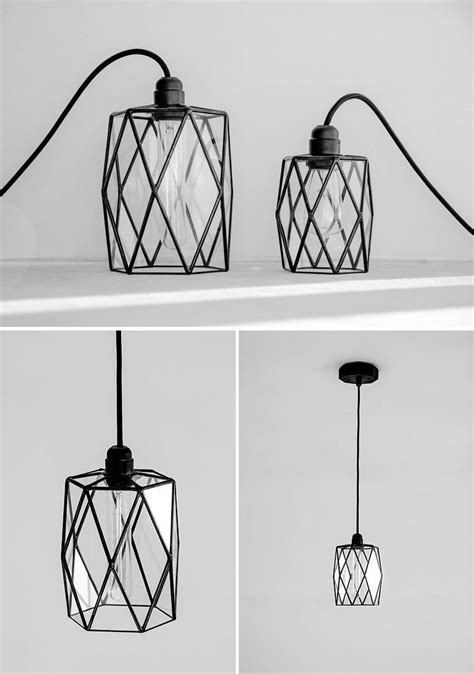 Unique in symmetry, these modern black glass pendant lights look different geometrically from ...