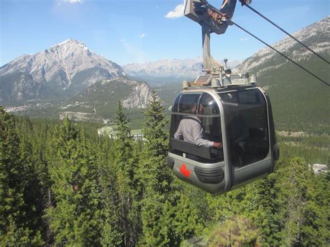 Banff Gondola, you'll see more mountains in a moment than most see in a ...