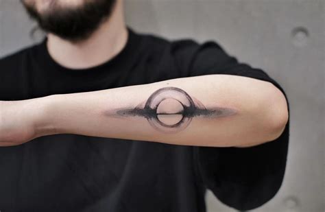 Black hole tattoo | Tasteful tattoos, Tattoos for guys, Small tattoos for guys