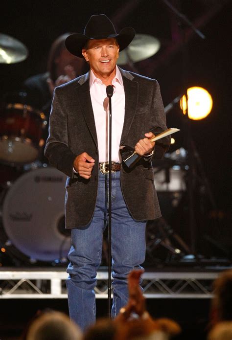 George Strait accepts the ACM Artist of the Decade award onstage during the 44th annual Academy ...