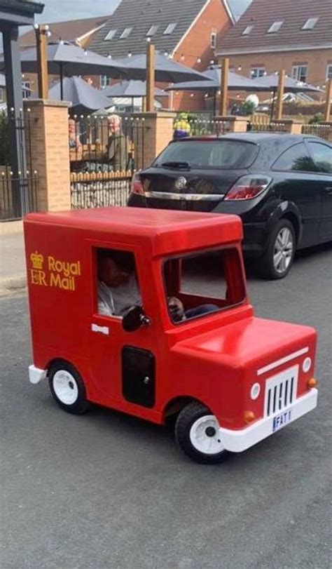 Hilarious video shows "Postman Pat" driving along streets in tiny van ...