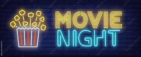 Movie night neon text with popcorn paper box Stock Vector | Adobe Stock