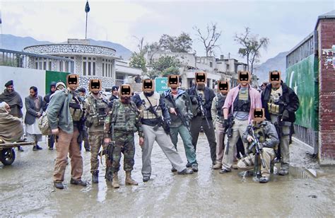 Members of CIA's Special Activities Division, Ground Branch Team with their indigenous force ...