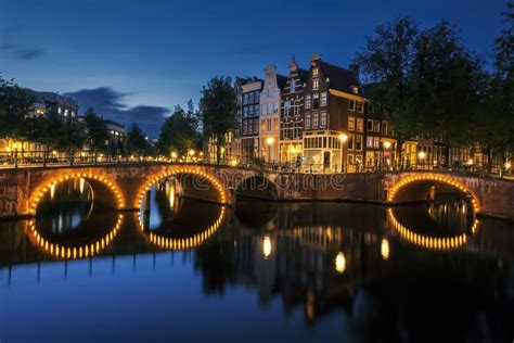 Amsterdam Canal by night stock image. Image of amsterdam - 267941843