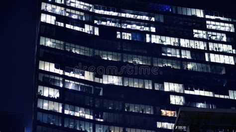 The Glass Facade of a Modern Skyscraper at Night. Modern Glass Office ...