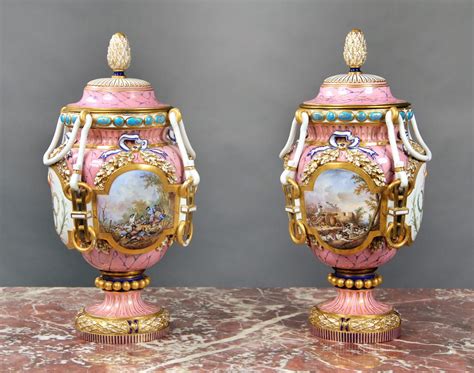 A Pair of Finely Painted Late 19th Century Pink Sèvres Style Porcelain Vases and Covers ...