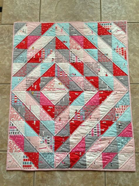 Baby girl quilt | Triangle quilt, Quilts, Half square triangle quilts