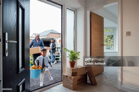 Moving Furniture Into New Home High-Res Stock Photo - Getty Images