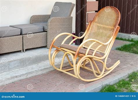 Empty Wooden Rattan Rocking Chair on House Terrace Backyard Outdoors. Peaceful Lifestyle Home ...