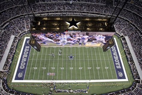 an aerial view of the football field at cowboys stadium