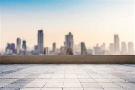 Premium Photo | Empty roof top balcony with cityscape background