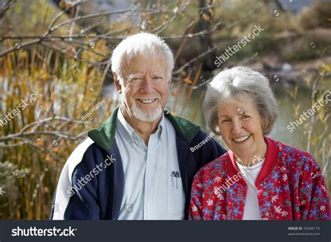 Smiling Elderly Couple Stock Photo 25448119 : Shutterstock