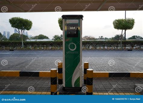 Smart Dubai Car Charging Stations in Parking Lot. Charging Modern ...