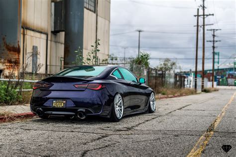 Stanced Infiniti Q60 Goes Racy with Custom Ground Effects and Ducktail Spoiler — CARiD.com Gallery