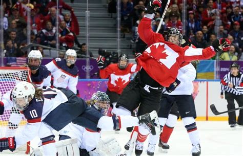 Marie-Philip Poulin of Canada celebrates her game tying goal against the USA during third period ...